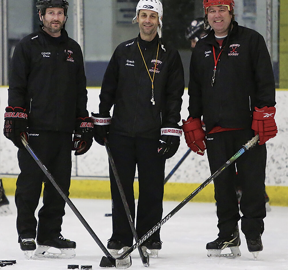 Coaches Drew Tierney, Andrew Schlie and Jon Grzbek