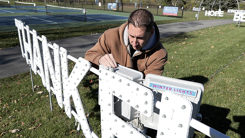 These are screen shots from video shot by Multimedia Services November 2023; Robert works for Oak Brook Park District and designs their holiday lights display every year.