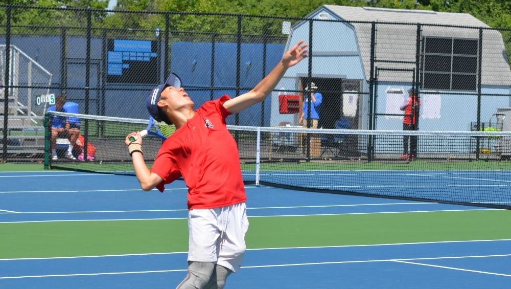 Hudson Tseng serves during the second round of the IHSA state tournament, where the Timothy Christian sophomore finished as the Class 1A state champion.
<br><i>Photo by Jeff Vorva</i>