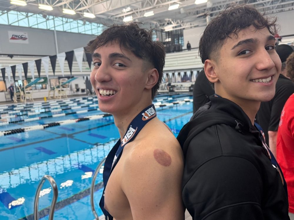 Luke Vatev (left) and his brother Matthew won back-to-back state championships at the IHSA state meet in late February.