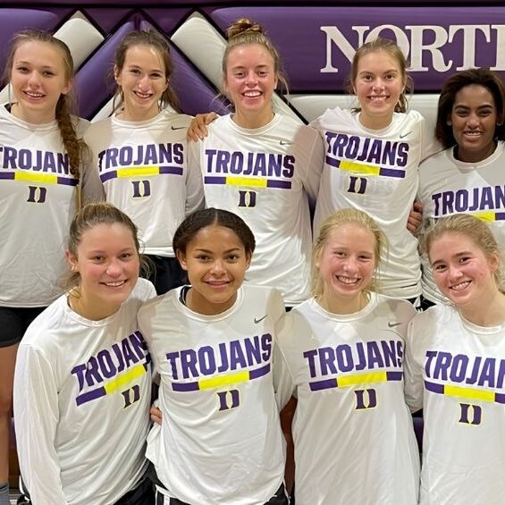 Among the Trojans teammates pictured, Ryann Wendt (far left), Violet Mitchell (third from left), Maggie Fleming (
fourth from left), and Kate Gross (fifth from left) shared both friendship and success on the court.