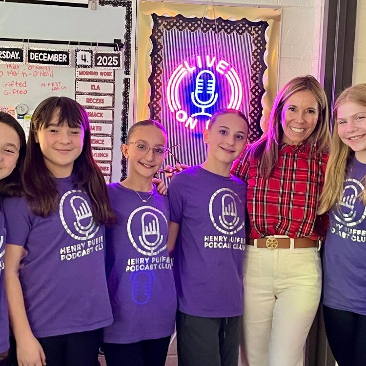 Christine-Reynolds-and-some-of-her-podcast-club-students-go-off-air-after-recording-an-episode-on-Dec.-4