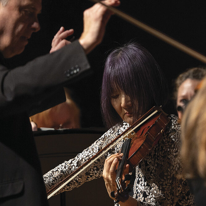 Concertmaster Rika Seko steps into the spotlight.