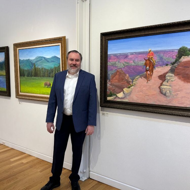 Fred-Mosss-own-artist-exhibition-at-the-Elmhurst-Art-Museum-entitled-Moments-in-Time_-A-Visual-Voyage_-ran-from-November-1-28.-Painting-to-his-left-is-_The-Grand-Trail