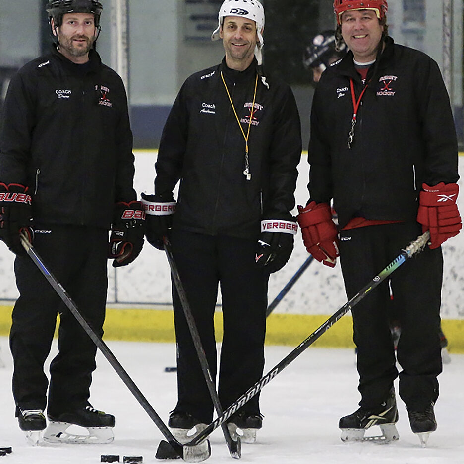 Coaches Drew Tierney, Andrew Schlie and Jon Grzbek