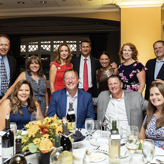 Readerlink Presenting Sponsor Table including Kristen &amp; Jon Anderson, Mike &amp; Tanya Nolan (front row), Dr. Allen &amp; Christine Bloom, Toni &amp; Mike Havala, Dionne Miller, Kathy &amp; Dennis Abboud (back row)