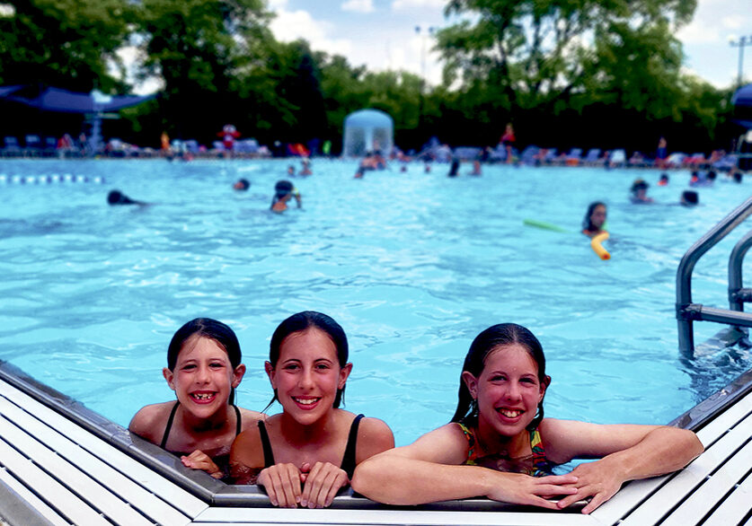 Longtime members Sloane, Ellery and Teegan Smith enjoy a summer swim this season at the pool.